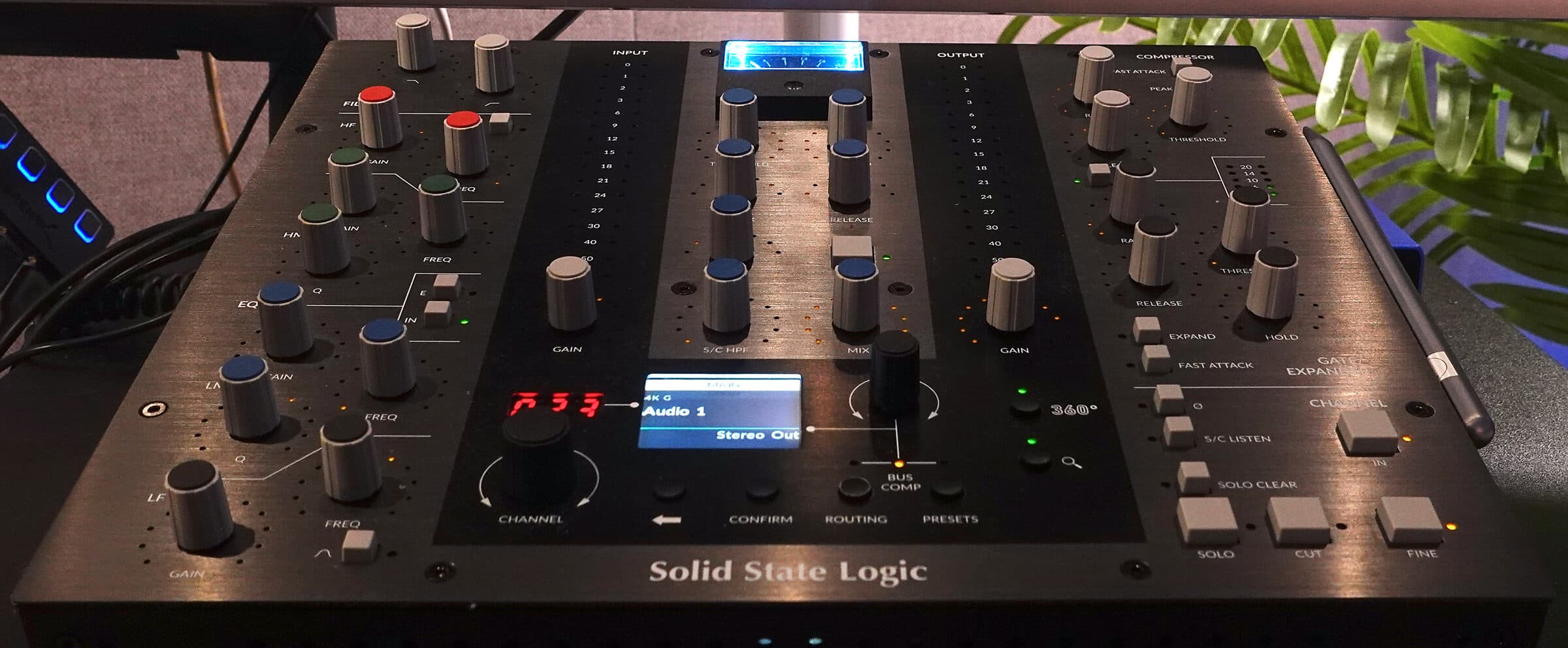 The Solid State Logic UC1 controller face-on: channel strip, bus compressor and metering